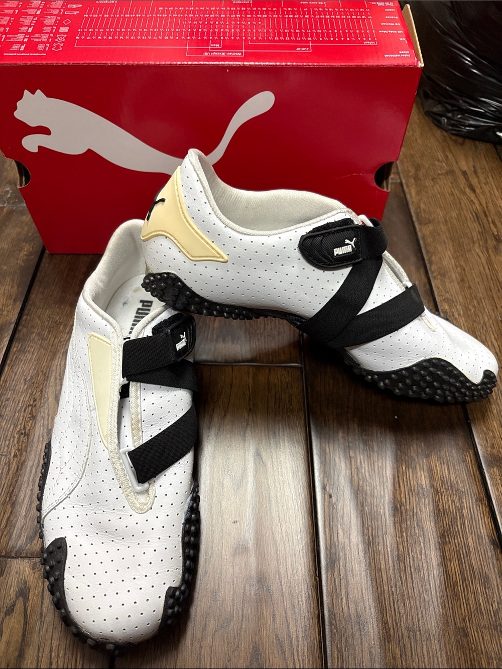 Women’s Mostro Perf Puma White and Black Driving Sneakers